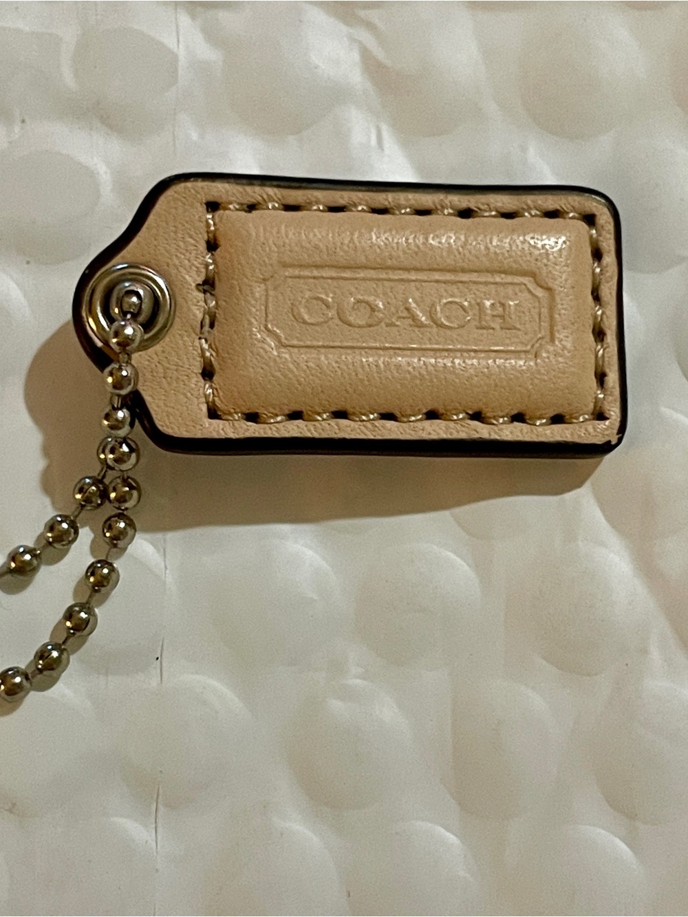 COACH Beige Leather Embossed Key Tag with Ball Chain